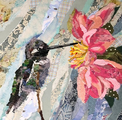 Paper collage "painting" of hummingbird and flower